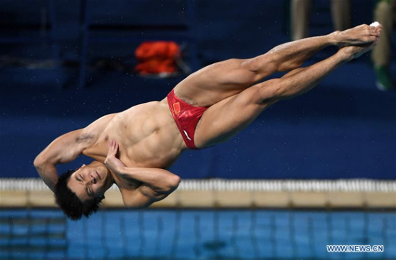 China's Cao Yuan competes during the men's 3m springboard final of Diving at the 2016 Rio Olympic Games in Rio de Janeiro, Brazil, on Aug. 16, 2016. Cao Yuan won the gold medal. (Xinhua/Wang Yuguo) China's Cao Yuan competes during the men's 3m springboard final of Diving at the 2016 Rio Olympic Games in Rio de Janeiro, Brazil, on Aug. 16, 2016. Cao Yuan won the gold medal. (Xinhua/Wang Yuguo)