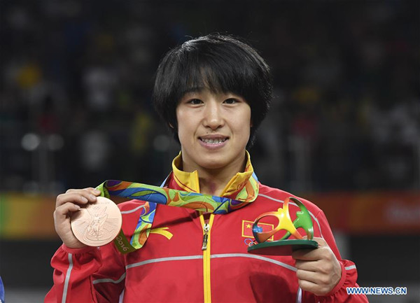 China's Sun Yanan attends the awarding ceremony for the women's Freestyle 48KG of Wrestling at the 2016 Rio Olympic Games in Rio de Janeiro, Brazil, on Aug. 17, 2016. Sun Yanan won a bronze medal. (Xinhua/Wu Wei) China's Sun Yanan attends the awarding ceremony for the women's Freestyle 48KG of Wrestling at the 2016 Rio Olympic Games in Rio de Janeiro, Brazil, on Aug. 17, 2016. Sun Yanan won a bronze medal. (Xinhua/Wu Wei)