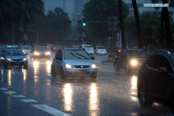 Cars drive on a road in Haikou, capital of south China's Hainan Province, Aug. 18, 2016. Hainan was affected by typhoon Dianmu, the eighth of the season, with many regions greeting heavy rainfall. (Photo: Xinhua/Yang Guanyu) Cars drive on a road in Haikou, capital of south China's Hainan Province, Aug. 18, 2016. Hainan was affected by typhoon Dianmu, the eighth of the season, with many regions greeting heavy rainfall. (Photo: Xinhua/Yang Guanyu)