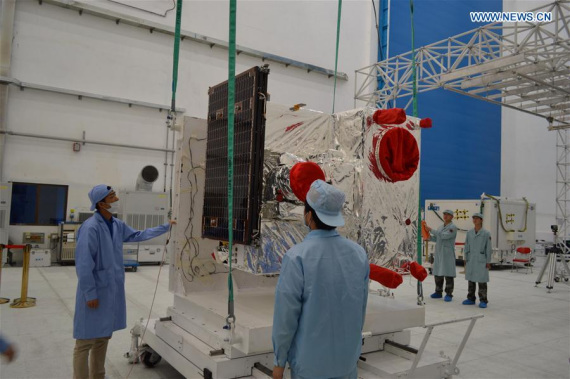 File photo taken on July 27, 2016 shows technical staff install solar wing for the experimental quantum communication satellite at the Jiuquan Satellite Launch Center in Jiuquan, northwest China's Gansu Province. (Photo/Xinhua) File photo taken on July 27, 2016 shows technical staff install solar wing for the experimental quantum communication satellite at the Jiuquan Satellite Launch Center in Jiuquan, northwest China's Gansu Province. (Photo/Xinhua)