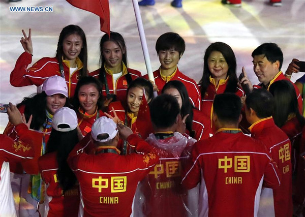 Members of China's delegation pose for photos at the Maracana Stadium during the closing ceremony of the 2016 Rio Olympic Games in Rio de Janeiro, Brazil, Aug. 21, 2016. (Xinhua/Han Yan) Members of China's delegation pose for photos at the Maracana Stadium during the closing ceremony of the 2016 Rio Olympic Games in Rio de Janeiro, Brazil, Aug. 21, 2016. (Xinhua/Han Yan)