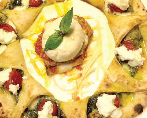 The kitchen team at La Pizza in Shangdu SOHO will substitute lactose-free cheese in any menu item. (Mike Peters / China Daily) The kitchen team at La Pizza in Shangdu SOHO will substitute lactose-free cheese in any menu item. (Mike Peters / China Daily)