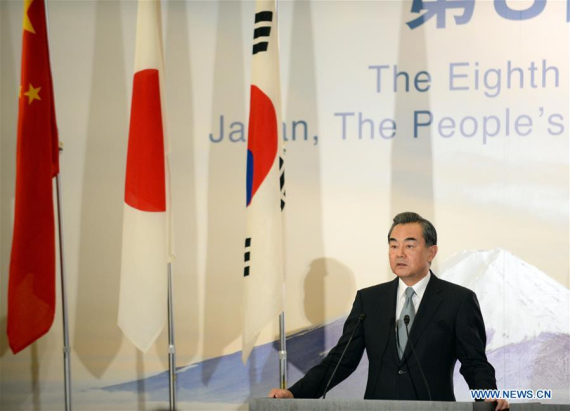 Chinese Foreign Minister Wang Yi speaks during a joint press conference in Tokyo, Japan, Aug. 24, 2016. The 8th trilateral foreign ministers' meeting was held here on Wednesday, with Chinese Foreign Minister Wang Yi, Japanese Foreign Minister Fumio Kishida and South Korean Foreign Minister Yun Byung Se attended. (Photo: Xinhua/Ma Ping) Chinese Foreign Minister Wang Yi speaks during a joint press conference in Tokyo, Japan, Aug. 24, 2016. The 8th trilateral foreign ministers' meeting was held here on Wednesday, with Chinese Foreign Minister Wang Yi, Japanese Foreign Minister Fumio Kishida and South Korean Foreign Minister Yun Byung Se attended. (Photo: Xinhua/Ma Ping)