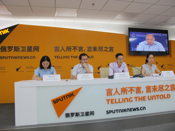 Scholars from Chinese Academy of Social Sciences exchange view with their Russian counterparts in a telephone conversation held between Beijing and Moscow on Aug 25 ahead of the 2016 G20 summit. (Photo by Wang Mengzhen/chinadaily.com.cn) Scholars from Chinese Academy of Social Sciences exchange view with their Russian counterparts in a telephone conversation held between Beijing and Moscow on Aug 25 ahead of the 2016 G20 summit. (Photo by Wang Mengzhen/chinadaily.com.cn)