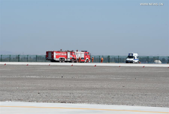 Fire engines and an ambulance are seen at the accident site after an acrobatic plane plummeted to the ground during the 1st Silk Road International General Aviation Convention in Zhangye, northwest China's Gansu Province, Aug. 27, 2016. The pilot of the acrobatic plane was killed. (Xinhua/Fan Peishen) Fire engines and an ambulance are seen at the accident site after an acrobatic plane plummeted to the ground during the 1st Silk Road International General Aviation Convention in Zhangye, northwest China's Gansu Province, Aug. 27, 2016. The pilot of the acrobatic plane was killed. (Xinhua/Fan Peishen)