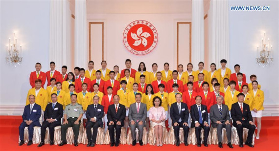 Guests pose for a group photo with members of a delegation of Chinese mainland Olympians during a banquet held by the government of Hong Kong Special Administrative Region to welcome the delegation, in Hong Kong, south China, Aug. 27, 2016. (Photo/Xinhua) Guests pose for a group photo with members of a delegation of Chinese mainland Olympians during a banquet held by the government of Hong Kong Special Administrative Region to welcome the delegation, in Hong Kong, south China, Aug. 27, 2016. (Photo/Xinhua)
