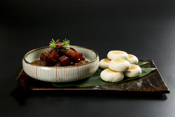 Pork braised in brown sauce, signature dishes of Zhangshengji. (Photo by Mike Peters/China Daily) Pork braised in brown sauce, signature dishes of Zhangshengji. (Photo by Mike Peters/China Daily)