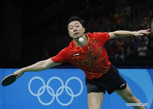 China's Zhang Jike returns the ball against Vladimir Samsonov of Belarus during men's singles semifinal of table tennis at the 2016 Rio Olympic Games in Rio de Janeiro, Brazil, on Aug. 11, 2016. Zhang Jike won 4-1. (Photo/Xinhua) China's Zhang Jike returns the ball against Vladimir Samsonov of Belarus during men's singles semifinal of table tennis at the 2016 Rio Olympic Games in Rio de Janeiro, Brazil, on Aug. 11, 2016. Zhang Jike won 4-1. (Photo/Xinhua)