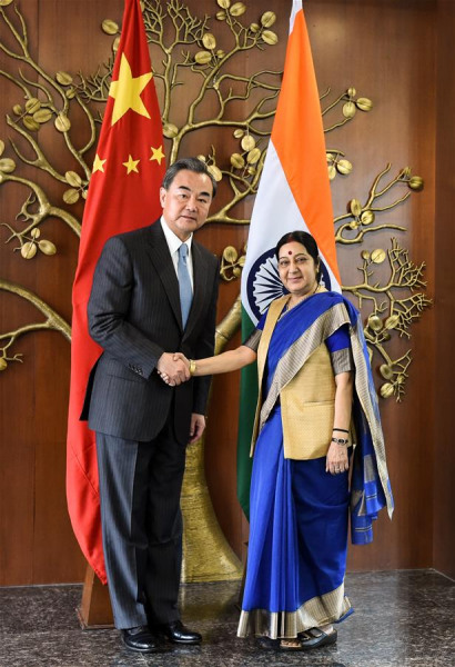 Chinese Foreign Minister Wang Yi (L) shakes hands with Indian Minister of External Affairs Sushma Swaraj in New Delhi, India, Aug. 13, 2016. (Xinhua/Bi Xiaoyang) Chinese Foreign Minister Wang Yi (L) shakes hands with Indian Minister of External Affairs Sushma Swaraj in New Delhi, India, Aug. 13, 2016. (Xinhua/Bi Xiaoyang)
