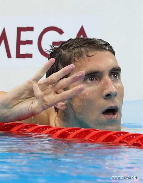 Michael Phelps of the United States celebrates after the men's 200m individual medley final at the 2016 Rio Olympic Games in Rio de Janeiro, Brazil, on Aug. 11, 2016. Michael Phelps won the gold medal. (Xinhua/Cao Can) Michael Phelps of the United States celebrates after the men's 200m individual medley final at the 2016 Rio Olympic Games in Rio de Janeiro, Brazil, on Aug. 11, 2016. Michael Phelps won the gold medal. (Xinhua/Cao Can)