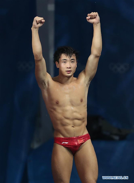 China's Cao Yuan celebrates after the men's 3m springboard final of Diving at the 2016 Rio Olympic Games in Rio de Janeiro, Brazil, on Aug. 16, 2016. Cao Yuan won the gold medal. (Xinhua/Cao Can) China's Cao Yuan celebrates after the men's 3m springboard final of Diving at the 2016 Rio Olympic Games in Rio de Janeiro, Brazil, on Aug. 16, 2016. Cao Yuan won the gold medal. (Xinhua/Cao Can)