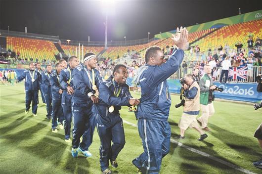 Fiji team with their gold medals during the medal ceremony for the Men's Rugby Sevens at Deodoro Stadium on August 11, 2016 in Rio de Janeiro, Brazil. (Photo/Xinhua) Fiji team with their gold medals during the medal ceremony for the Men's Rugby Sevens at Deodoro Stadium on August 11, 2016 in Rio de Janeiro, Brazil. (Photo/Xinhua)