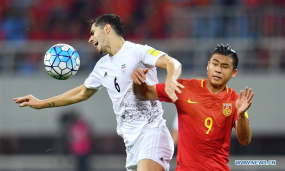 China's Zhang Yuning (R) vies with Iran's Saeid Ezatolahi during the Russia 2018 World Cup Asian Qualifier match between China and Iran in Shenyang, capital of northeast China's Liaoning Province, on Sept. 6, 2016. (Photo: Xinhua/Tao Xiyi) China's Zhang Yuning (R) vies with Iran's Saeid Ezatolahi during the Russia 2018 World Cup Asian Qualifier match between China and Iran in Shenyang, capital of northeast China's Liaoning Province, on Sept. 6, 2016. (Photo: Xinhua/Tao Xiyi)