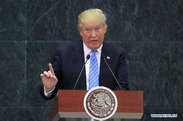 U.S. Republican presidential candidate Donald Trump addresses a joint press conference with Mexican President Enrique Pena Nieto (not seen in the picture) after their meeting in Mexico City, capital of Mexico, on Aug. 31, 2016. (Xinhua/Str) U.S. Republican presidential candidate Donald Trump addresses a joint press conference with Mexican President Enrique Pena Nieto (not seen in the picture) after their meeting in Mexico City, capital of Mexico, on Aug. 31, 2016. (Xinhua/Str)