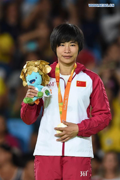 Li Liqing of China attends the medal presenting ceremony after the Women's Judo 48KG gold medal contest of Rio 2016 Paralympic Games in Rio de Janeiro, Brazil, on Sept. 8, 2016. Li Liqing won the gold. (Xinhua/Ou Dongqu) Li Liqing of China attends the medal presenting ceremony after the Women's Judo 48KG gold medal contest of Rio 2016 Paralympic Games in Rio de Janeiro, Brazil, on Sept. 8, 2016. Li Liqing won the gold. (Xinhua/Ou Dongqu)