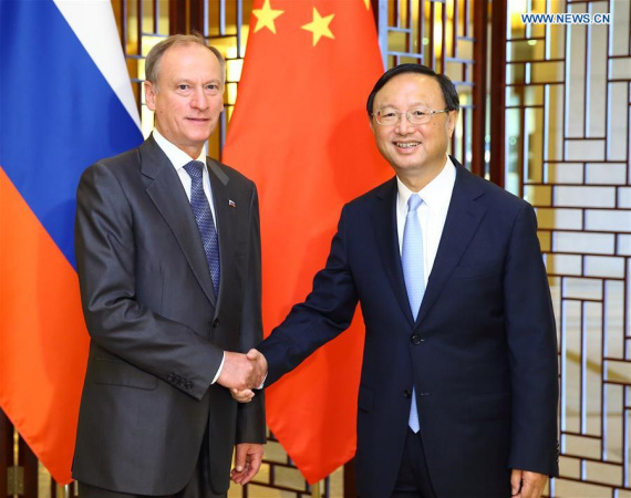 Chinese State Councilor Yang Jiechi (R) shakes hands with Secretary of Russia's Security Council Nikolai Patrushev, who is here to attend the 12th round of China-Russia strategic security consultation, in Beijing, capital of China, Sept. 12, 2016. (Photo: Xinhua/Ding Haitao) Chinese State Councilor Yang Jiechi (R) shakes hands with Secretary of Russia's Security Council Nikolai Patrushev, who is here to attend the 12th round of China-Russia strategic security consultation, in Beijing, capital of China, Sept. 12, 2016. (Photo: Xinhua/Ding Haitao)
