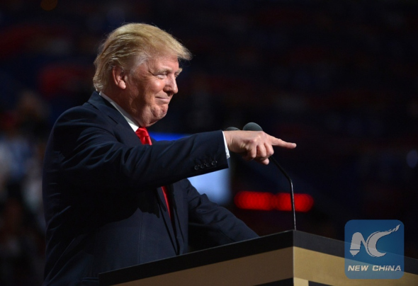 Donald Trump takes the stage on the last day of the Republican National Convention in Cleveland, Ohio, the United States, July 21, 2016. New York billionaire Donald Trump officially accepted the presidential nomination of the U.S. Republican Party Thursday night on the final day of the Republican National Convention. (Photo/Xinhua) Donald Trump takes the stage on the last day of the Republican National Convention in Cleveland, Ohio, the United States, July 21, 2016. New York billionaire Donald Trump officially accepted the presidential nomination of the U.S. Republican Party Thursday night on the final day of the Republican National Convention. (Photo/Xinhua)