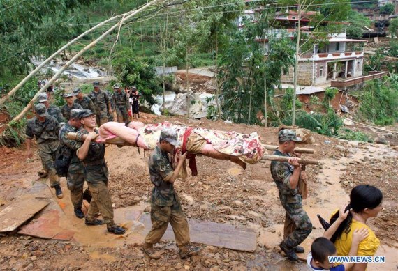 Rescuers relocate an injured man in Nan'an, southeast China's Fujian Province, Sept. 16, 2016. Disaster relief and reconstruction were launched after Typhoon Meranti swept away and left severe damages. (Photo: Xinhua/Jiang Kehong) Rescuers relocate an injured man in Nan'an, southeast China's Fujian Province, Sept. 16, 2016. Disaster relief and reconstruction were launched after Typhoon Meranti swept away and left severe damages. (Photo: Xinhua/Jiang Kehong)