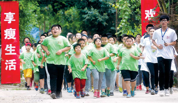Children exercise at a summer camp for overweight minors in Qingdao, Shandong province, in July. (Photos by He Yi / For China Daily) Children exercise at a summer camp for overweight minors in Qingdao, Shandong province, in July. (Photos by He Yi / For China Daily)