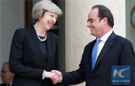French President Francois Hollande(R) shakes hands with British Prime Minister Theresa May during their meeting at the Elysee Palace in Paris, France on July 21, 2016. (Xinhua/Alan Wilson) French President Francois Hollande(R) shakes hands with British Prime Minister Theresa May during their meeting at the Elysee Palace in Paris, France on July 21, 2016. (Xinhua/Alan Wilson)