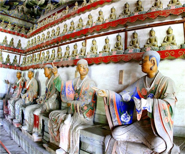 Clay sculptures in Thousand-Buddha Hall in the temple. JU CHUANJIANG/CHINA DAILY Clay sculptures in Thousand-Buddha Hall in the temple. JU CHUANJIANG/CHINA DAILY