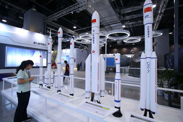 Models of rockets from the Long March series are on display at an aviation technology exhibition in Beijing on Sept 18. (Photo: Chen Xiaogen/For China Daily) Models of rockets from the Long March series are on display at an aviation technology exhibition in Beijing on Sept 18. (Photo: Chen Xiaogen/For China Daily)
