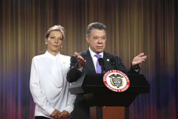 Colombian President Juan Manuel Santos (R) delivers a statement after the announcement of being awarded with the 2016 Nobel Peace Prize, accompanied by his wife Maria Clemencia Rodriguez (L) in Bogota, Colombia, on Oct. 7, 2016. (Photo: Xinhua/COLPRENSA) Colombian President Juan Manuel Santos (R) delivers a statement after the announcement of being awarded with the 2016 Nobel Peace Prize, accompanied by his wife Maria Clemencia Rodriguez (L) in Bogota, Colombia, on Oct. 7, 2016. (Photo: Xinhua/COLPRENSA)
