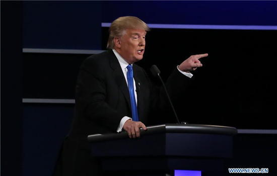 Republican Donald Trump speaks during the first presidential debate with Democrat Hillary Clinton at Hofstra University in Hempstead of New York, the United States, Sept. 26, 2016. Donald Trump and Hillary Clinton on Monday held their first presidential debate in Hempstead. (Xinhua/Qin Lang) Republican Donald Trump speaks during the first presidential debate with Democrat Hillary Clinton at Hofstra University in Hempstead of New York, the United States, Sept. 26, 2016. Donald Trump and Hillary Clinton on Monday held their first presidential debate in Hempstead. (Xinhua/Qin Lang)