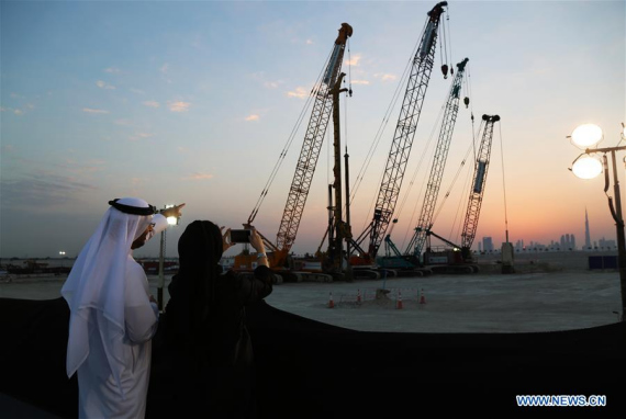 Guests take photos of the construction site of the one billion U.S. dollars project, the Tower at Dubai Creek Harbour, in Dubai, the United Arab Emirates, Oct. 10, 2016. (Photo: Xinhua/Li Zhen) Guests take photos of the construction site of the one billion U.S. dollars project, the Tower at Dubai Creek Harbour, in Dubai, the United Arab Emirates, Oct. 10, 2016. (Photo: Xinhua/Li Zhen)