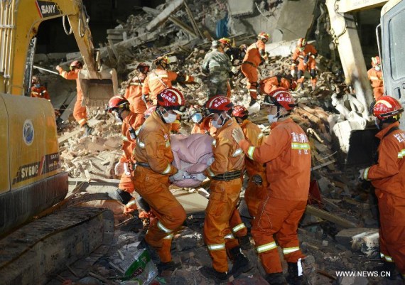 Rescuers carry the body of a victim at the accident site in Lucheng industrial district in Wenzhou City, east China's Zhejiang Province, Oct. 10, 2016. (Photo/Xinhua) Rescuers carry the body of a victim at the accident site in Lucheng industrial district in Wenzhou City, east China's Zhejiang Province, Oct. 10, 2016. (Photo/Xinhua)