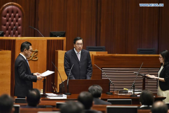 Leung Kwan-yuen (C) are seen at the first meeting of the sixth term of Legislative Council (LegCo) in Hong Kong, south China, Oct. 12, 2016. (Photo: Xinhua/Wang Shen) Leung Kwan-yuen (C) are seen at the first meeting of the sixth term of Legislative Council (LegCo) in Hong Kong, south China, Oct. 12, 2016. (Photo: Xinhua/Wang Shen)
