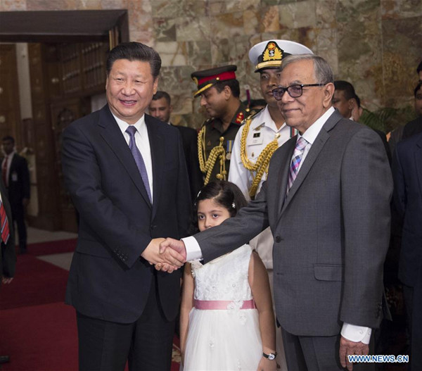 Chinese President Xi Jinping (L) meets with his Bangladeshi counterpart Abdul Hamid in Dhaka, Bangladesh, Oct. 14, 2016. (Xinhua/Xie Huanchi) Chinese President Xi Jinping (L) meets with his Bangladeshi counterpart Abdul Hamid in Dhaka, Bangladesh, Oct. 14, 2016. (Xinhua/Xie Huanchi)