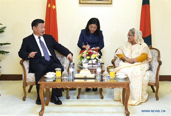 Chinese President Xi Jinping (L) holds talks with Bangladeshi Prime Minister Sheikh Hasina in Dhaka, Bangladesh, Oct. 14, 2016. (Xinhua/Xie Huanchi) Chinese President Xi Jinping (L) holds talks with Bangladeshi Prime Minister Sheikh Hasina in Dhaka, Bangladesh, Oct. 14, 2016. (Xinhua/Xie Huanchi)