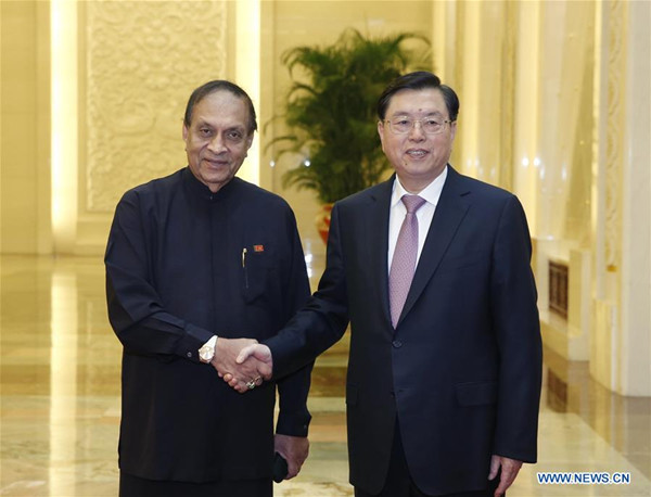 Zhang Dejiang (R), chairman of the Standing Committee of the National People's Congress (NPC), holds talks with the Speaker of the Sri Lankan parliament Karu Jayasuriya in Beijing, capital of China, Oct. 14, 2016. (Xinhua/Ju Peng) Zhang Dejiang (R), chairman of the Standing Committee of the National People's Congress (NPC), holds talks with the Speaker of the Sri Lankan parliament Karu Jayasuriya in Beijing, capital of China, Oct. 14, 2016. (Xinhua/Ju Peng)