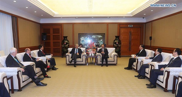 Sun Zhengcai(back R), a member of the Political Bureau of the Communist Party of China (CPC) Central Committee and head of the CPC Chongqing Municipal Committee, meets with guests from France, Britain and New Zealand, who are here to attend The CPC in Dialogue with the World 2016, in southwest China's Chongqing, Oct. 15, 2016. The CPC and political parties from overseas countries completed a two-day in-depth discussion and exchanges on global economic governance in Chongqing on Saturday, and released the Chongqing Initiative as a result of the The CPC in Dialogue with the World 2016. Over 300 delegates from more than 70 political parties and organizations in 50 countries attended the conference. (Xinhua) Sun Zhengcai(back R), a member of the Political Bureau of the Communist Party of China (CPC) Central Committee and head of the CPC Chongqing Municipal Committee, meets with guests from France, Britain and New Zealand, who are here to attend The CPC in Dialogue with the World 2016, in southwest China's Chongqing, Oct. 15, 2016. The CPC and political parties from overseas countries completed a two-day in-depth discussion and exchanges on global economic governance in Chongqing on Saturday, and released the Chongqing Initiative as a result of the The CPC in Dialogue with the World 2016. Over 300 delegates from more than 70 political parties and organizations in 50 countries attended the conference. (Xinhua)