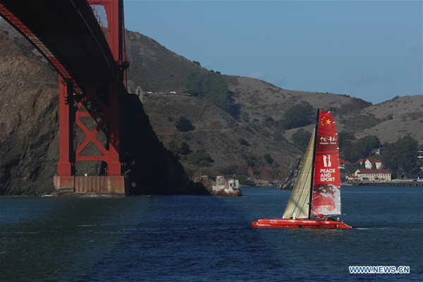 Chinese mariner Guo Chuan sails his trimaran under San Francisco's Golden Gate Bridge, the United States, embarking on a solo trans-Pacific voyage with Shanghai, China, as the destination, Oct. 18, 2016. He aims to complete the voyage within 20 days to set a new solo non-stop trans-Pacific sailing world record from San Francisco to Shanghai. The current record is 21 days set by crews of Italian Maserati. (Photo/Xinhua) Chinese mariner Guo Chuan sails his trimaran under San Francisco's Golden Gate Bridge, the United States, embarking on a solo trans-Pacific voyage with Shanghai, China, as the destination, Oct. 18, 2016. He aims to complete the voyage within 20 days to set a new solo non-stop trans-Pacific sailing world record from San Francisco to Shanghai. The current record is 21 days set by crews of Italian Maserati. (Photo/Xinhua)