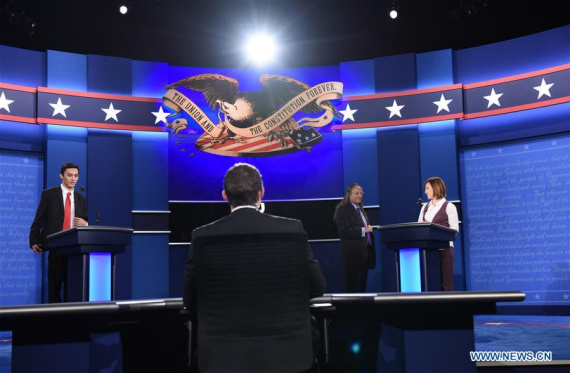 TV staff rehearse live broadcasting for the Final Presidential Debate at the University of Nevada Las Vegas (UNLV) in Las Vegas, Nevada, the United States, Oct. 19, 2016. (Photo: Xinhua/Yin Bogu) TV staff rehearse live broadcasting for the Final Presidential Debate at the University of Nevada Las Vegas (UNLV) in Las Vegas, Nevada, the United States, Oct. 19, 2016. (Photo: Xinhua/Yin Bogu)