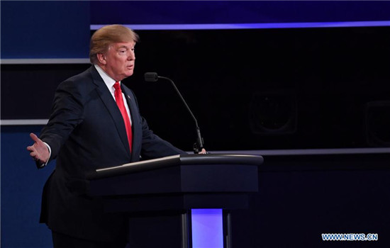 Republican presidential candidate Donald Trump participates in the third and final presidential debate at the University of Nevada Las Vegas (UNLV) in Las Vegas, Nevada, the United States, Oct.19, 2016.(Xinhua/Yin Bogu) Republican presidential candidate Donald Trump participates in the third and final presidential debate at the University of Nevada Las Vegas (UNLV) in Las Vegas, Nevada, the United States, Oct.19, 2016.(Xinhua/Yin Bogu)