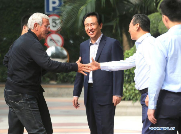 Italian soccer coach Marcello Lippi (L) shakes hands with Cai Zhenhua, president of China Football Association (CFA), in Guangzhou, capital of south China's Guangdong Province, Oct. 22, 2016. (Photo/Xinhua) Italian soccer coach Marcello Lippi (L) shakes hands with Cai Zhenhua, president of China Football Association (CFA), in Guangzhou, capital of south China's Guangdong Province, Oct. 22, 2016. (Photo/Xinhua)