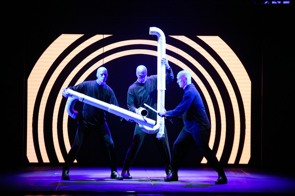 Three blue men drum on PVC tubes during the dressed rehearsal for Blue Man Group's debut show in the Guangzhou Opera House. (Photo provided to China Daily) Three blue men drum on PVC tubes during the dressed rehearsal for Blue Man Group's debut show in the Guangzhou Opera House. (Photo provided to China Daily)