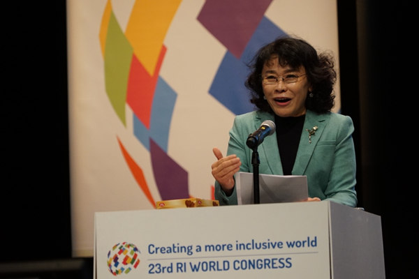 Zhang Haidi, chairwoman of Rehabilitation International (RI) speaks at her inauguration at the RI Congress in Edinburgh, Scotland, on Oct 27. Lin Wei Guang/For China Daily Zhang Haidi, chairwoman of Rehabilitation International (RI) speaks at her inauguration at the RI Congress in Edinburgh, Scotland, on Oct 27. Lin Wei Guang/For China Daily