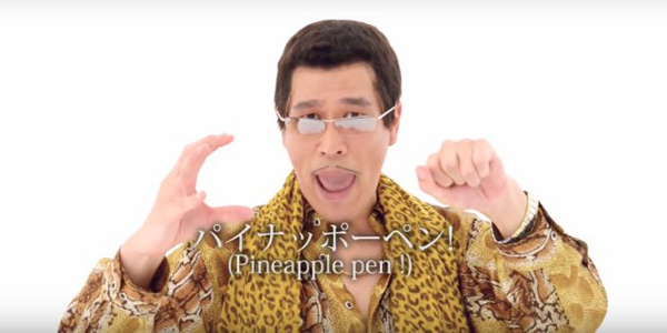 Japanese DJ Piko-Taro performs the song Pen-Pineapple-Apple-Pen on the music video. (Photo/Weibo) Japanese DJ Piko-Taro performs the song Pen-Pineapple-Apple-Pen on the music video. (Photo/Weibo)