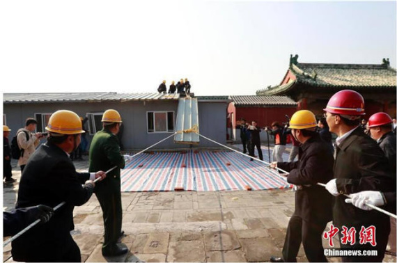 Workers demolish a makeshift building at the Palace Museum. (File photo/Chinanews.com) Workers demolish a makeshift building at the Palace Museum. (File photo/Chinanews.com)