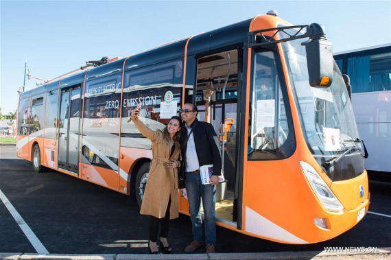 Two Moroccans take selfie with an electric bus from China in Marrakech, Morocco, Nov. 9, 2016. Over ten electric buses from China served the delegates during the 22nd Conference of Parties to the United Nations Framework Convention on Climate Change (COP22) in Marrakech. (Photo:Xinhua/Meng Tao) Two Moroccans take selfie with an electric bus from China in Marrakech, Morocco, Nov. 9, 2016. Over ten electric buses from China served the delegates during the 22nd Conference of Parties to the United Nations Framework Convention on Climate Change (COP22) in Marrakech. (Photo:Xinhua/Meng Tao)