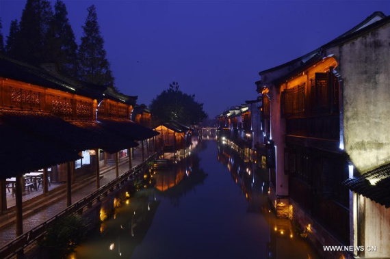 Photo taken on Nov. 14, 2016 shows a night scene in Wuzhen Township of Tongxiang City, east China's Zhejiang Province. The third World Internet Conference (WIC) is scheduled from Nov. 16 to 18 in Wuzhen. (Photo/Xinhua) Photo taken on Nov. 14, 2016 shows a night scene in Wuzhen Township of Tongxiang City, east China's Zhejiang Province. The third World Internet Conference (WIC) is scheduled from Nov. 16 to 18 in Wuzhen. (Photo/Xinhua)