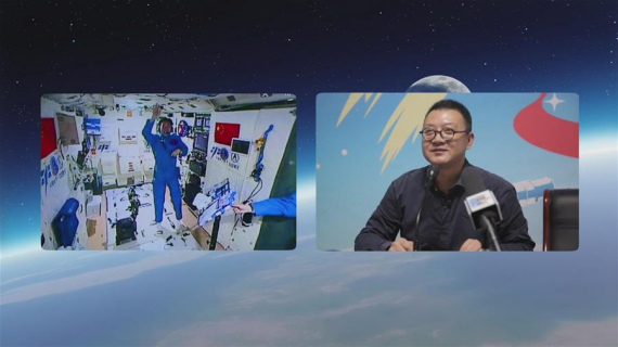 Photo provided by Astronaut Center of China shows Chinese astronauts Jing Haipeng (R) and Chen Dong accept their first earth-space interview in Tiangong-2, Nov. 15, 2016. (Photo/Xinhua) Photo provided by Astronaut Center of China shows Chinese astronauts Jing Haipeng (R) and Chen Dong accept their first earth-space interview in Tiangong-2, Nov. 15, 2016. (Photo/Xinhua)