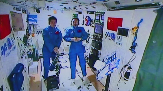 Photo provided by Astronaut Center of China shows Chinese astronauts Jing Haipeng (R) and Chen Dong accept their first earth-space interview in Tiangong-2, Nov. 15, 2016. (Photo/Xinhua) Photo provided by Astronaut Center of China shows Chinese astronauts Jing Haipeng (R) and Chen Dong accept their first earth-space interview in Tiangong-2, Nov. 15, 2016. (Photo/Xinhua)