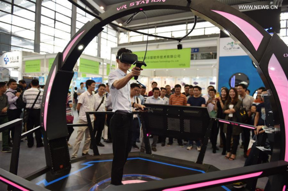 A man experiences a VR game at the China Hi-Tech Fair in Shenzhen, south China's Guangdong Province, Nov. 17, 2016. (Photo: Xinhua/Mao Siqian) A man experiences a VR game at the China Hi-Tech Fair in Shenzhen, south China's Guangdong Province, Nov. 17, 2016. (Photo: Xinhua/Mao Siqian)