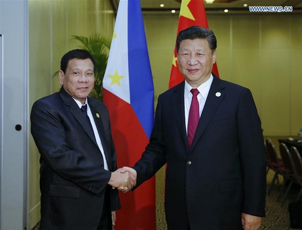 Chinese President Xi Jinping (R) meets with his Philippine counterpart Rodrigo Duterte in Lima, Peru, Nov. 19, 2016. (Xinhua/Ju Peng) Chinese President Xi Jinping (R) meets with his Philippine counterpart Rodrigo Duterte in Lima, Peru, Nov. 19, 2016. (Xinhua/Ju Peng)