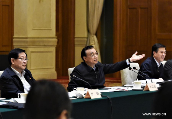 Chinese Premier Li Keqiang (C) presides over a meeting on simplifying administrative procedure and delegating power, in Shanghai, east China, Nov. 21, 2016. (Photo: Xinhua/Rao Aimin) Chinese Premier Li Keqiang (C) presides over a meeting on simplifying administrative procedure and delegating power, in Shanghai, east China, Nov. 21, 2016. (Photo: Xinhua/Rao Aimin)